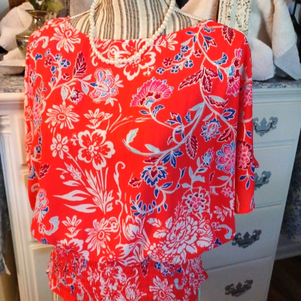 Bold Elements orange and floral design Blouse, fitted waist with flowy sleeves